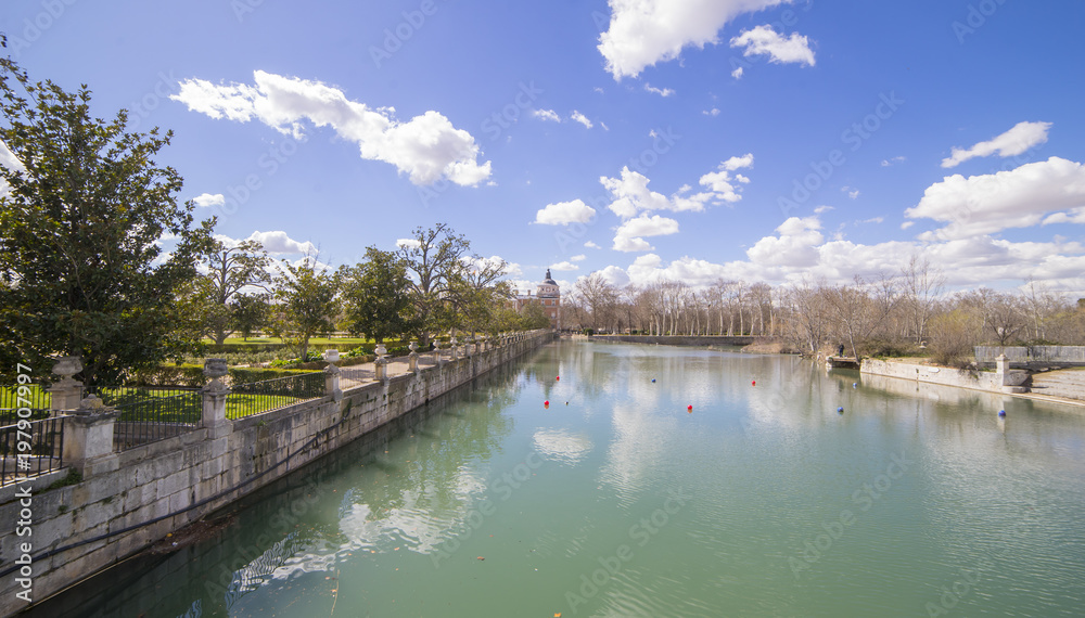 The Tajo River next to the Palace of Aranjuez. waterfalls with ducks and geese