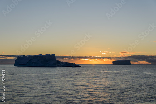 Tabular iceberg at sunset © Alexey Seafarer