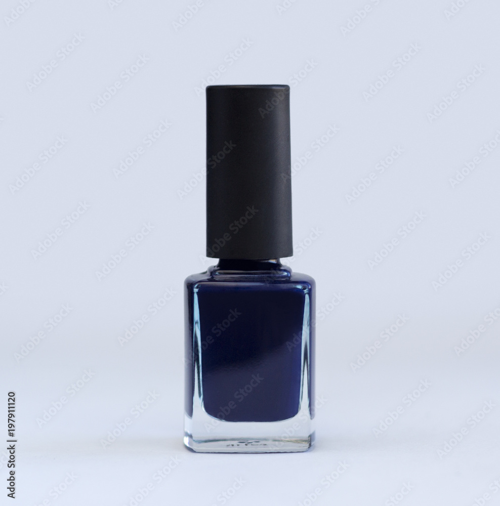 Blue nail polish bottle on whitw background Blue nail polish bottle on whitw background
