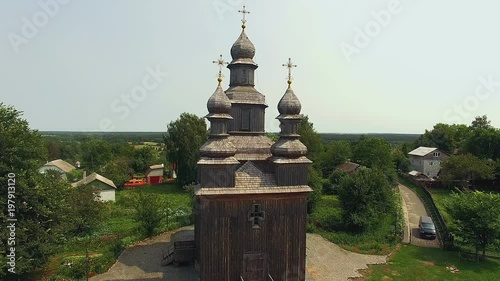 St. George's Church in Sednev where they filmed the movie Viy by Gogol,aerial view of church in Sednev, 4K aerial view of old wooden church,Ancient wooden church of St. George in Sednev, Ukraine photo