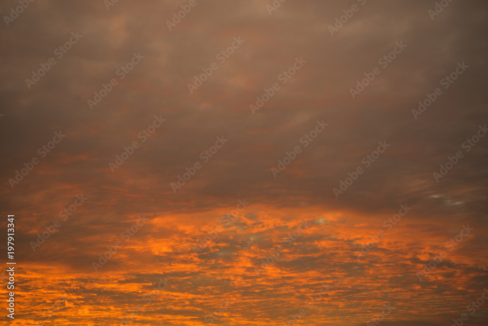 Crimson clouds at sunset. background.