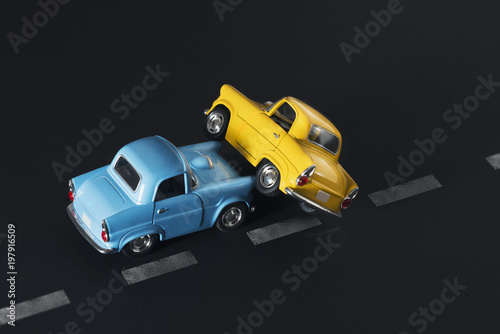 Traffic accident by toy cars. photo