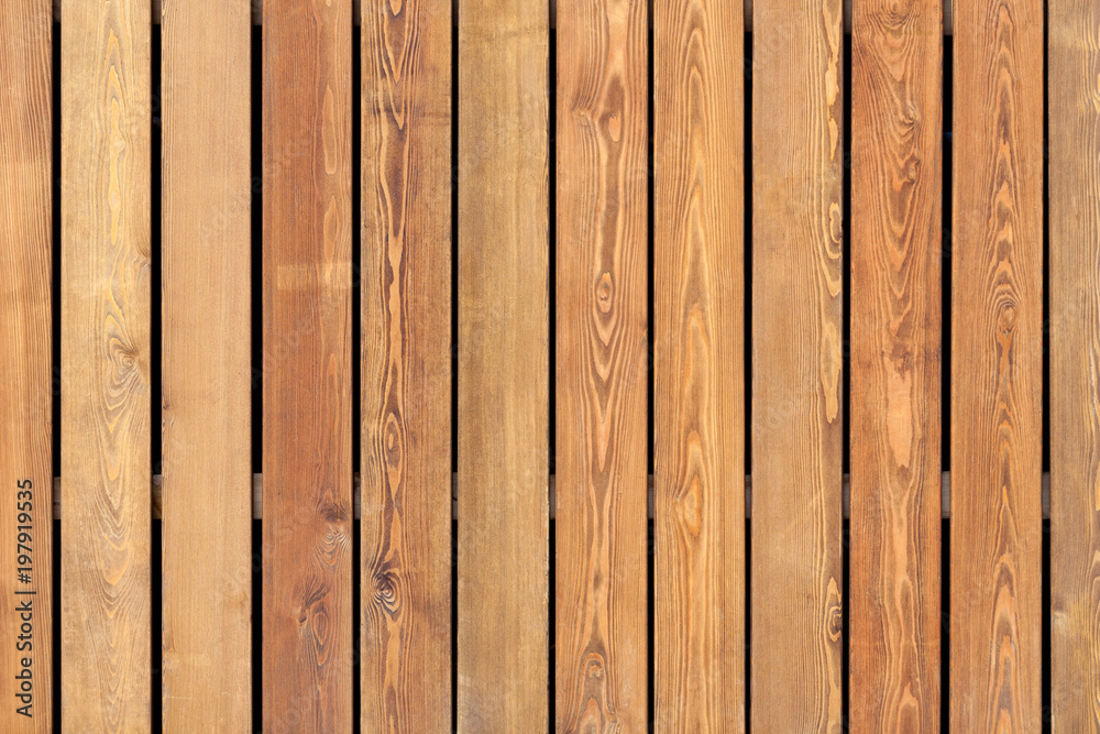 Fototapeta premium Brown wooden boards planks with natural grain as background, texture