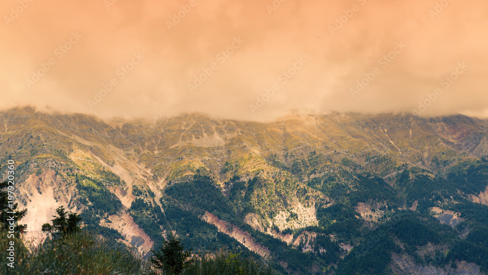 Panoramic view of mountain in National Park of Tzoumerka, Greece Epirus region. Mountain in the clouds