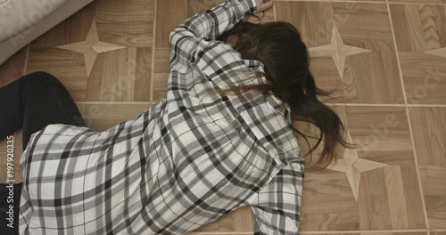 Unconscious or dead woman on floor.