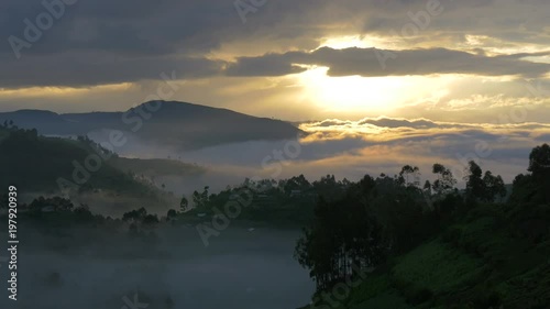 Landscape with hills covered with mist photo