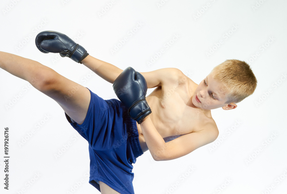 In boxing gloves athlete beats kicking In boxing gloves athlete beats kicking