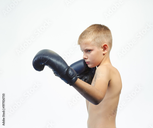 Little boxer is beating punch a left hand