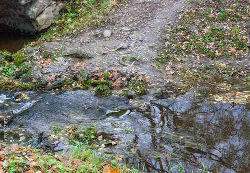 Water splashing over the rocks in the park