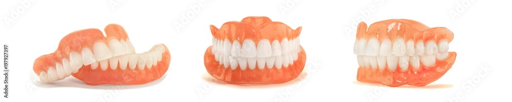 dentures. Isolate on white background acrylic prosthesis of human jaws. The concept of orthopedic dentistry dentures. Isolate on white background acrylic prosthesis of human jaws. The concept of orthopedic dentistry
