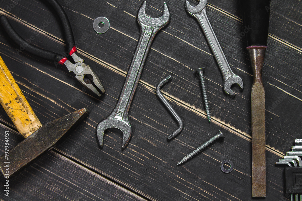 Joinery tools on a dark wooden table. Place for the text. A concept for Father's Day. Joinery tools on a dark wooden table. Place for the text. A concept for Father's Day.