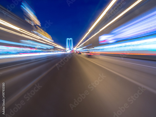 Speed motion on the neon glowing road at dark. © pozdeevvs