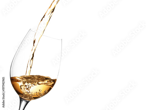 pouring white wine in a glass, isolated