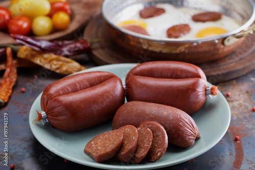 Turkish sausages Sucuk with fried eggs