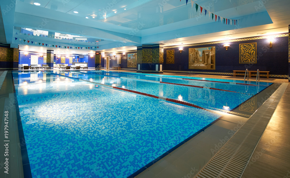 Fototapeta premium Interior of public swimming pool in a luxury fitness gym.