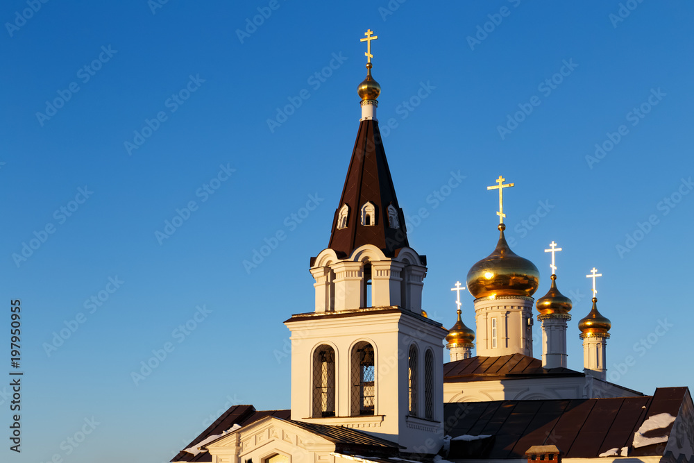 Orthodox christian church in Nizhny Novgorod city in Russia at winter sunset