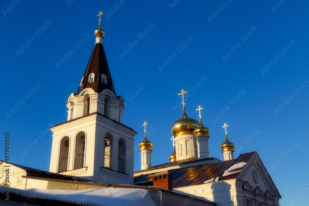 Orthodox christian church in Nizhny Novgorod city in Russia at winter sunset