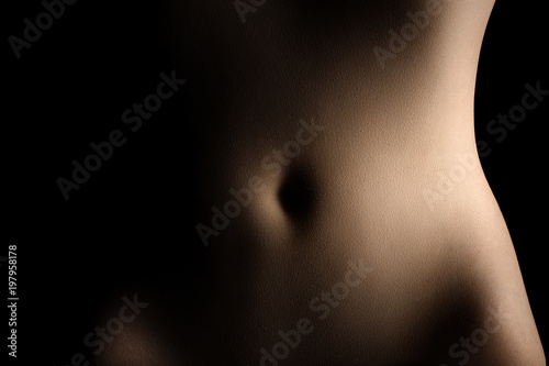 Bodyscape of woman's stomach photo