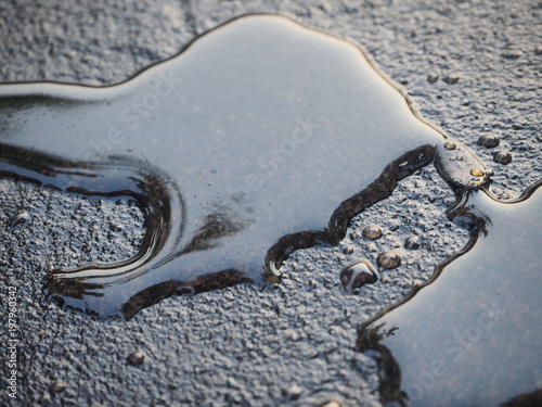 engine oil drops on the floor make pollution for our world
