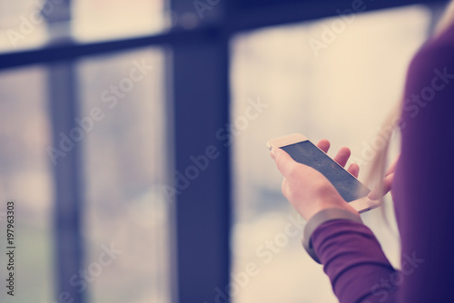 business woman using smart phone at office © .shock