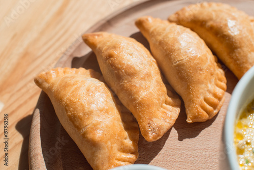 A delicious empanadas with chicken meat  typical dish of Argentinean cuisine