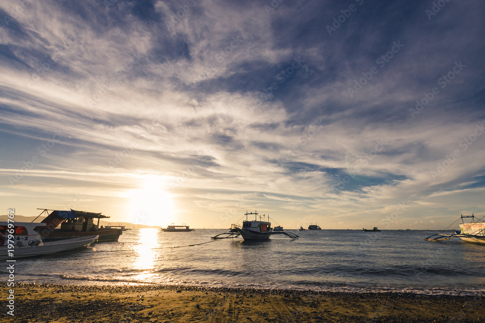 Fotografie Boat moored on a beach in Malay