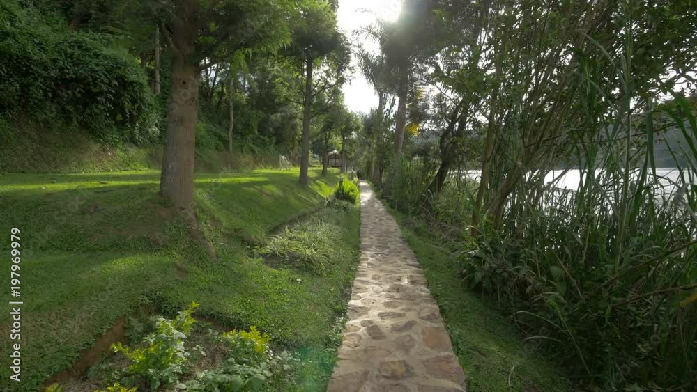 Alley on the shore of Lake Bunyonyi, Uganda Alley on the shore of Lake Bunyonyi, Uganda