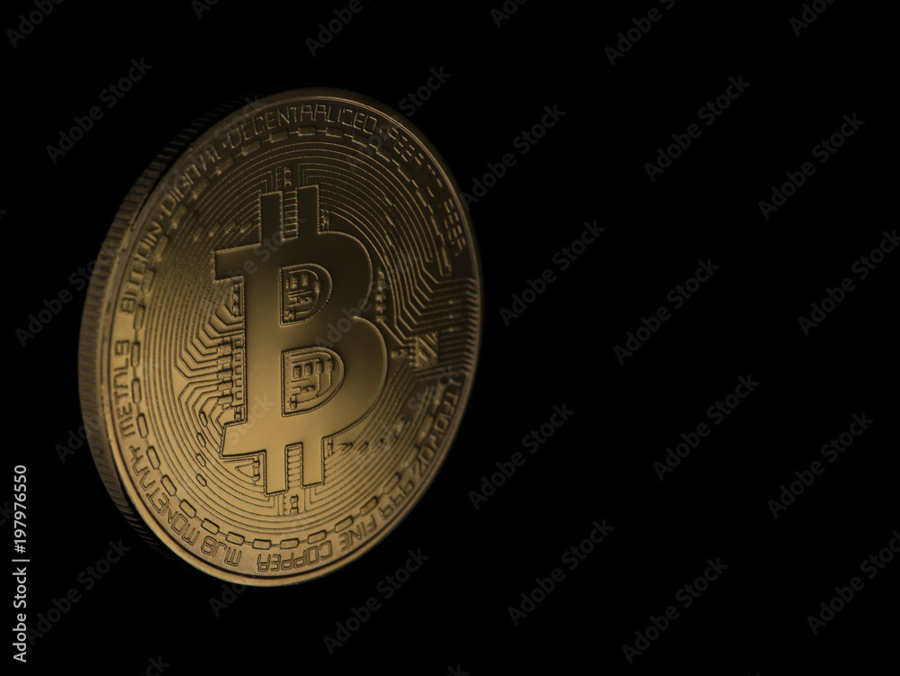 Golden bitcoin on black background with copy space. electronic money isolated Golden bitcoin on black background with copy space. electronic money isolated