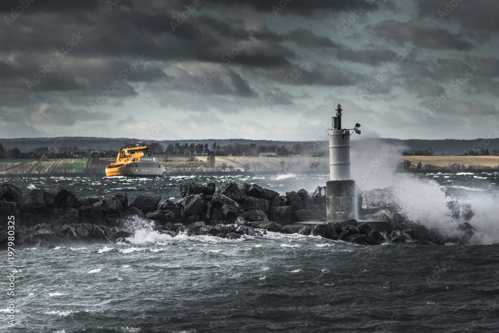 Yellow ship struggling in stormy weather