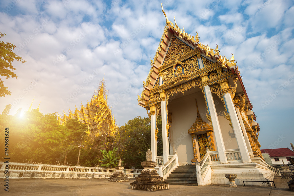 Naklejka premium Temple(Wat Chan West) in Beautiful fluffy cloudsat Phitsanulok, Thailand.
