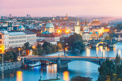 Obraz na plátně bridges with historic Charles Bridge and Vltava river at night in Prague, Czech