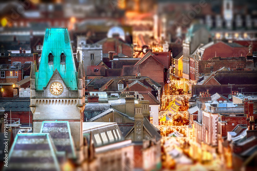 Canvas Print Winchester city view at night with Christmas market stalls in the high street