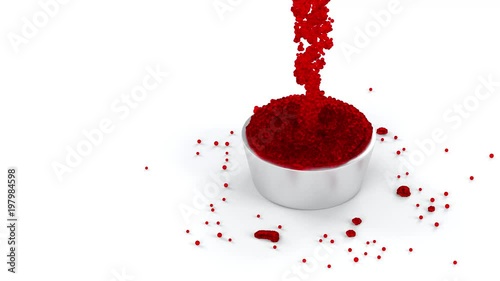 Red and Sticky Fluid with lots of micro balls flowing in a Metallic Cup photo