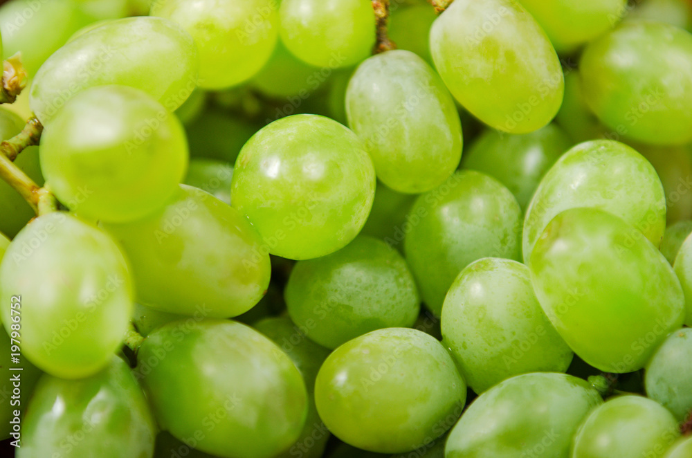 Background green grape without pits. Sweet fruit Background green grape without pits. Sweet fruit