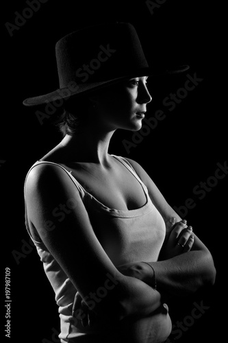 Young woman in a black hat