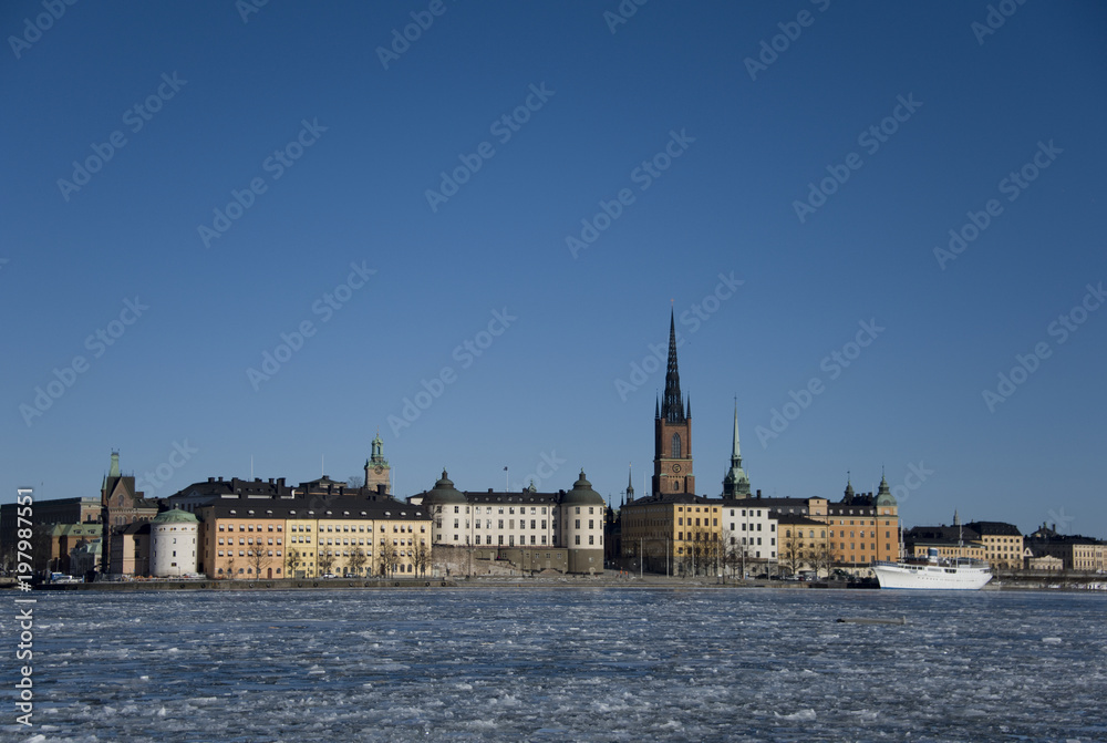 Before sunset at the lake Malaren and Riddarholmen, The Knights' Islet, the old town and City Hall
