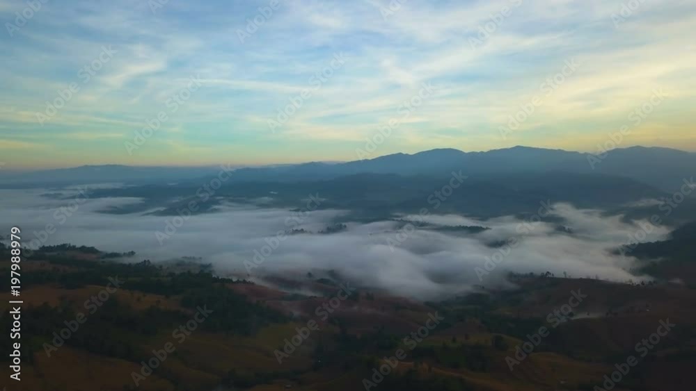Aerial View. Flying over the high mountains in beautiful clouds morning. Aerial camera shot. Air clouds. thailand Aerial View. Flying over the high mountains in beautiful clouds morning. Aerial camera shot. Air clouds. thailand