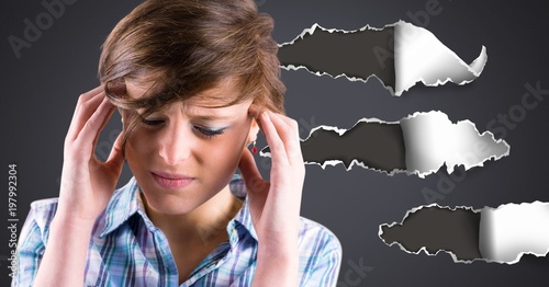 Stressed and upset woman with torn paper photo