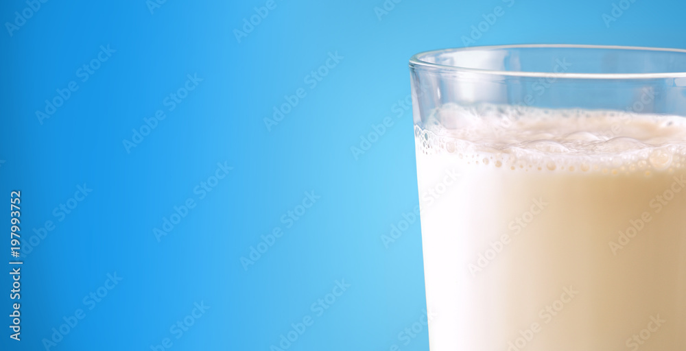 Glass full with milk on blue gradient isolated background Glass full with milk on blue gradient isolated background