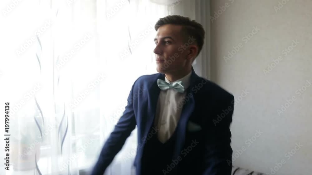 Close up of businessman wearing a tie, shirt, and suit. Close up of businessman wearing a tie, shirt, and suit.