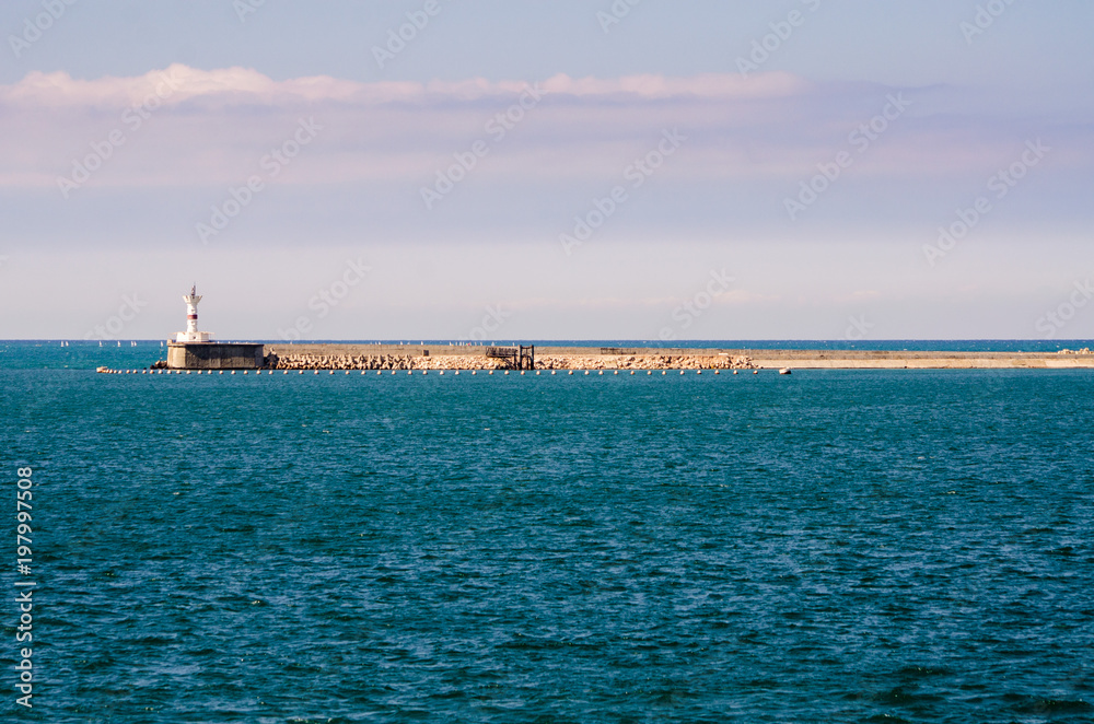 View of the old pier in the sea
