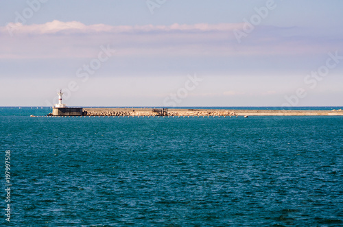 View of the old pier in the sea