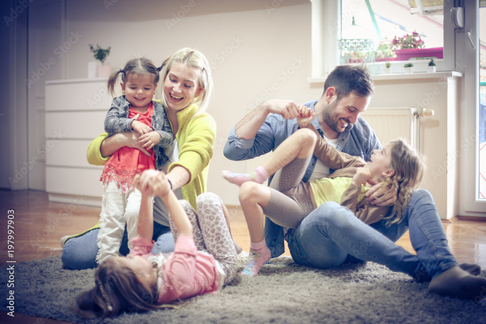 Parent splaying with kids.