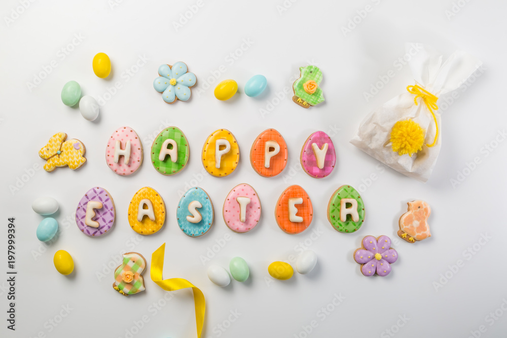 Easter concept - bunny shaped bag with eggs and flowers on bright yellow background,