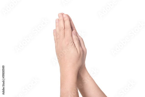 Two praying hands from left to right with bare arms - concept relegion faith prayer church god Christianity Jesus Christ - solated on white background with copy space photo