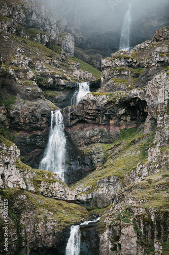 majestic icelandic landscape with spectacular waterfall on rocks, Eastern Iceland