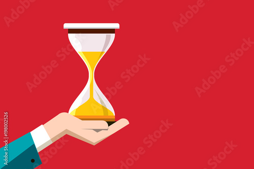 Flat Design Hourglass in Human Hand on Red Background. Vector Sand Clock Symbol with Empty Space on Right Side.