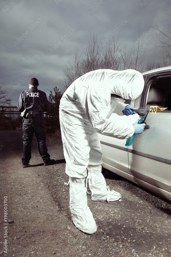 Crime scene investigation - developing of latent fingerprint on car Crime scene investigation - developing of latent fingerprint on car