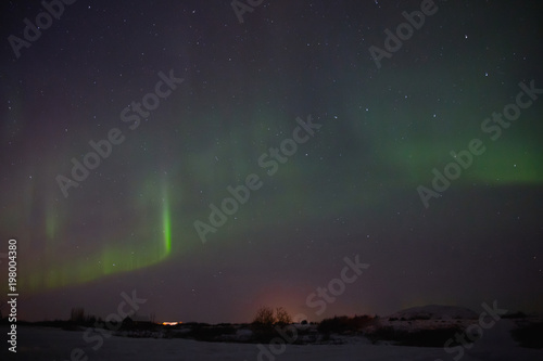 beautiful night sky with magnificent aurora borealis in iceland © LIGHTFIELD STUDIOS