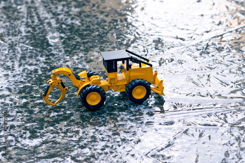 a bulldozer running on the ice.